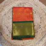 Burnt Orange Silk Saree with Forest Green Zari Border