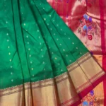 Elegant Emerald Green Silk Saree with Zari Buttas and Designer Red Brocade Pallu