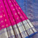 Vibrant Pink Silk Saree with Zari Buttas and Royal Blue Peacock Border Pallu